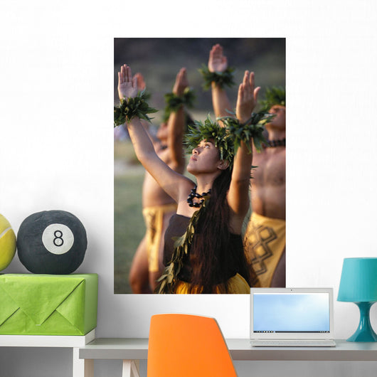Side Angle Of Hula Dancers Kahiko All With Arms Raised, Looking Upward Wall Mural
