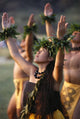Side Angle Of Hula Dancers Kahiko All With Arms Raised, Looking Upward Wall Mural