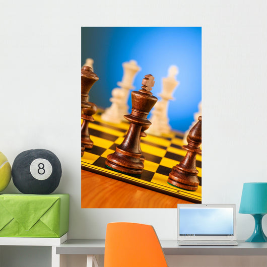 Chess concept with pieces on the board Wall Mural