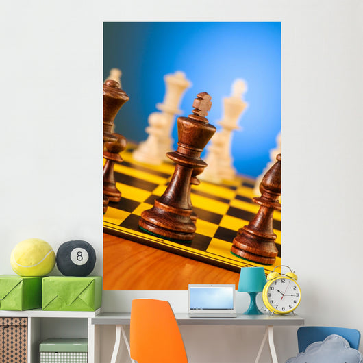 Chess concept with pieces on the board Wall Mural