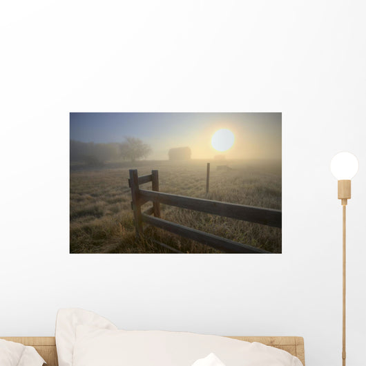 Foggy Autumn Sunrise Over Abandoned Farm With Fence And Barn Wall Mural