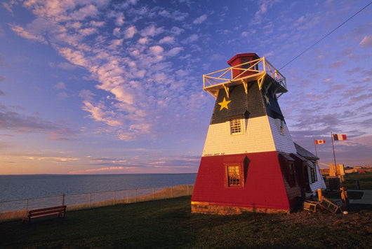 Lighthouse Painted In Colours Of The Acadian Flag Wall Mural
