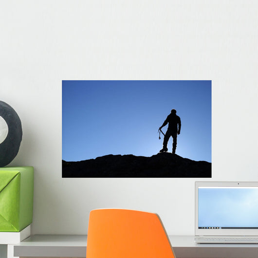 Silhouette Of A Rock Climber Wall Mural