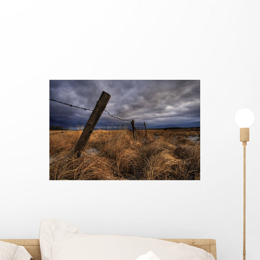 Barbed Wire Fence Posts With Dark Sky In Background, Alberta Wall Mural