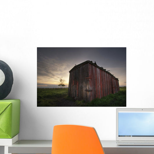 An Abandoned Railway Boxcar Converted To A Storage Shed At Sunset Wall Mural