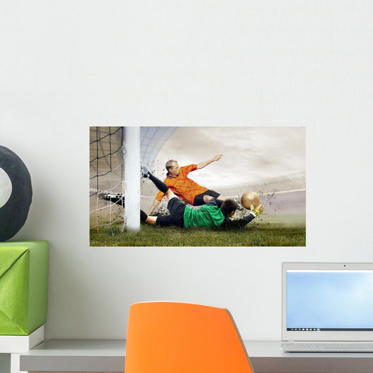 Shoot of football player and jump of goalkeeper on the field of Wall Mural