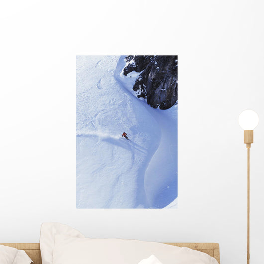 Young Man Skiing On Ungroomed Slope Near Fortress Mountain Wall Mural