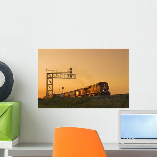 Locomotives Pulling Rail Hopper Cars Pass An Overhead Rail Signal Wall Mural