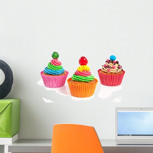 three colorful creamed cupcakes with a cherry and chocolate on t Wall Decal