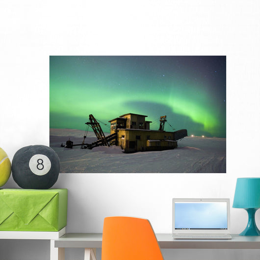 Green Northern Lights Dance Over A Historical Gold Dredge Near Nome Wall Mural