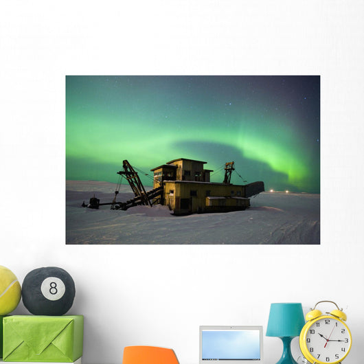 Green Northern Lights Dance Over A Historical Gold Dredge Near Nome Wall Mural