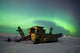 Green Northern Lights Dance Over A Historical Gold Dredge Near Nome Wall Mural