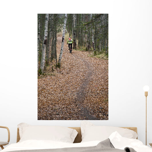 Woman Mountain Biking Wall Mural