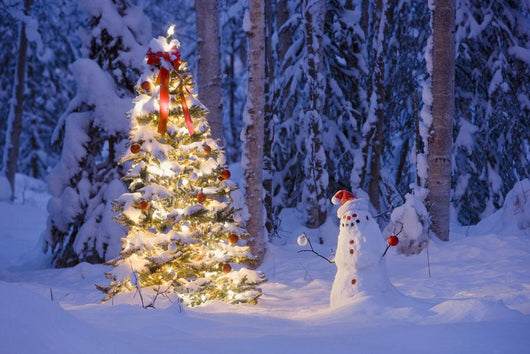 Snowman With Santa Hat Hanging Ornaments On A Christmas Tree Wall Mural