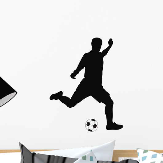 player kicking soccer Wall Decal