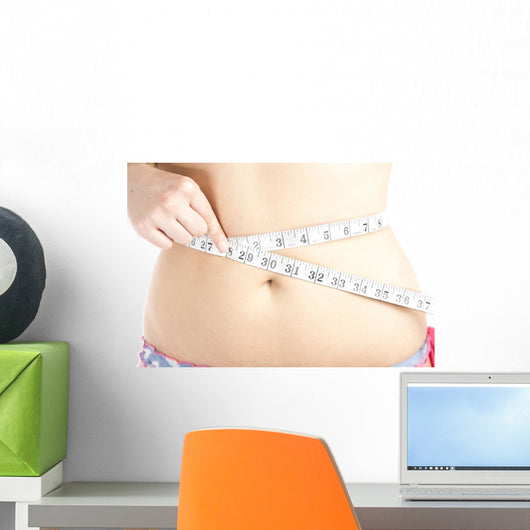 Woman Measuring Her Belly Wall Mural