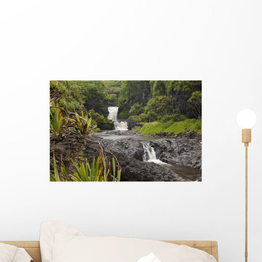 Hawaii, Maui, Hana, Seven Sacred Pools, a large stream and waterfalls Wall Mural