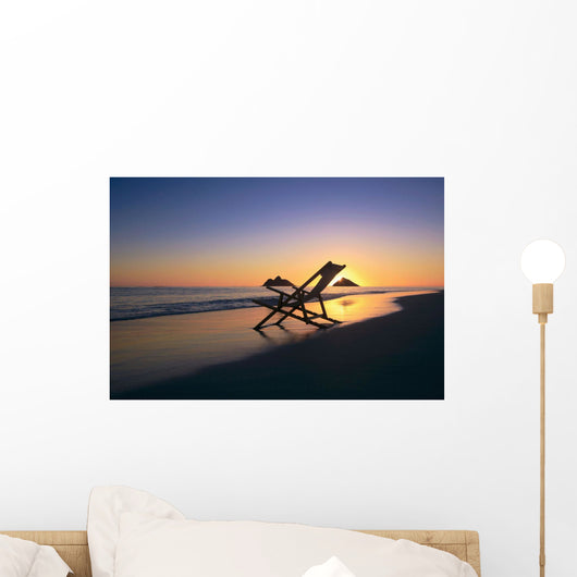 Hawaii, Lanikai, Empty beach chair at sunset Wall Mural