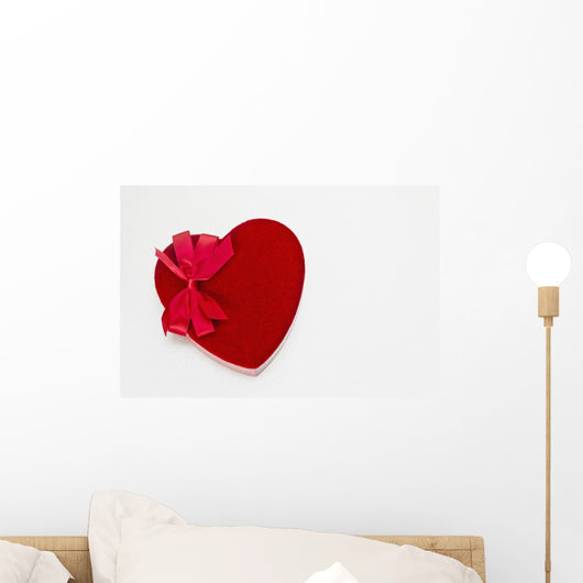 Valentines heart-shaped candy box against white background Wall Mural