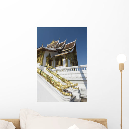 Architectural detail of dragpns along side of building Wall Mural