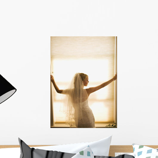 A Bride Pondering Her Big Day While Looking Out A Window Wall Mural