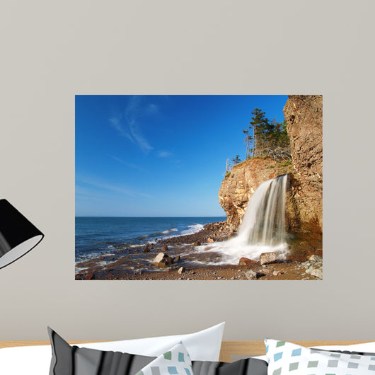 beach side waterfall Wall Mural