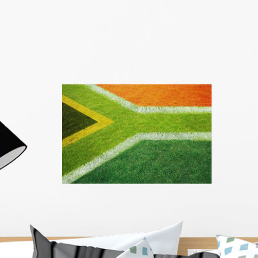 South African flag on football or rugby pitch Wall Mural
