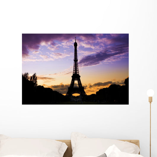 Eiffel Tower Against a coloful sunset Wall Mural