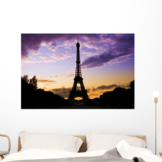 Eiffel Tower Against a coloful sunset Wall Mural