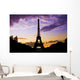 Eiffel Tower Against a coloful sunset Wall Mural
