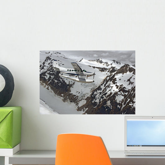 Cessna Caravan Amphibian Seaplane Flying Through The Coast Mountains Wall Mural