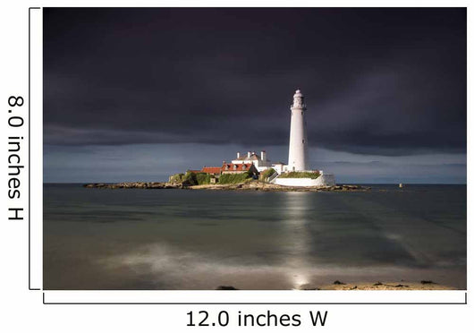 White Lighthouse Illuminated By Sunlight Under A Dark Stormy Sky Wall Mural