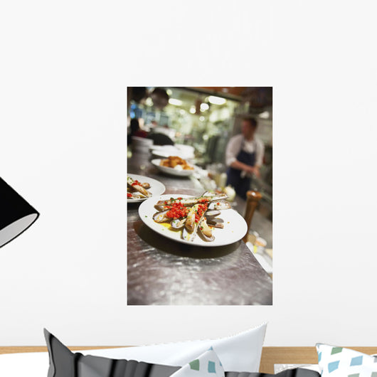 Razor clams on a plate in a restaurant Wall Mural