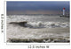 Storm waves crashing on a beach near a lighthouse on lake ontario Wall Mural