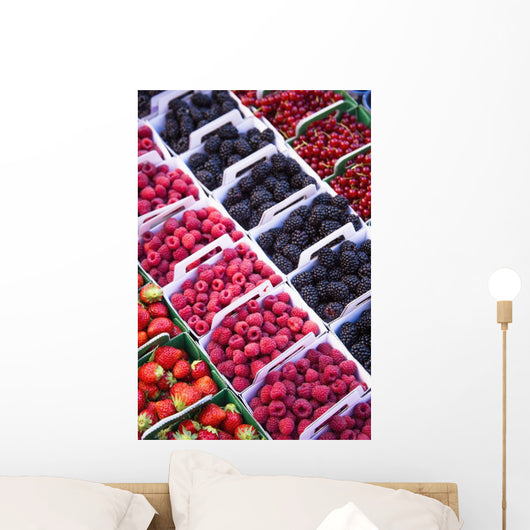 Berries in boxes at a food market;Sault vaucluse provence france Wall Mural