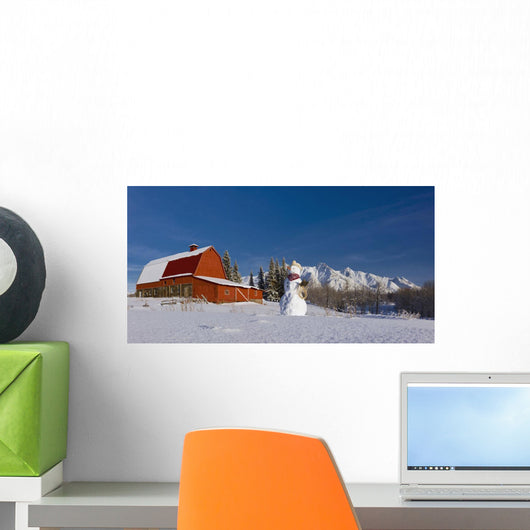 Snowman Dressed Up As A Cowboy Standing In Front Of A Vintage Red Barn Wall Mural