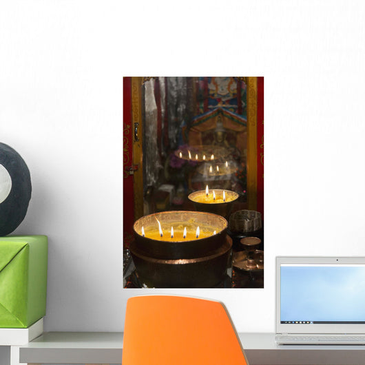 Flames burning in a row in large bronze pots;Lhasa xizang china Wall Mural