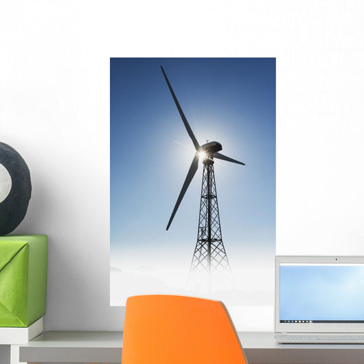 Sunlight illuminating a wind turbine;Tarifa cadiz andalusia spain Wall Mural