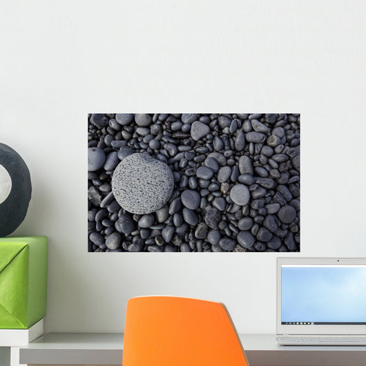 Close-up of smooth rocks on a beach Wall Mural