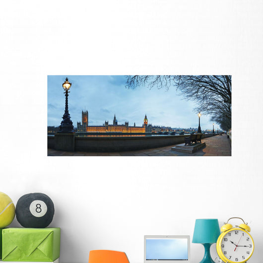 UK, Panoramic view of Houses of Parliament at dusk from River Thames Wall Mural