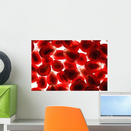Close up of pomegranate seeds backlit;Calgary alberta canada Wall Mural