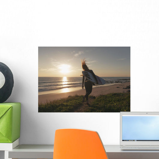 Spain, Andalusia, Cadiz, Costa de la Luz, Surfer on beach Wall Mural