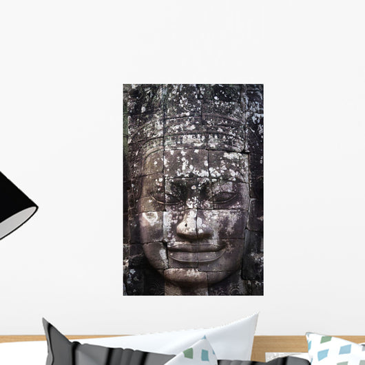 A face sculpture on a stone wall at angkor wat;Cambodia Wall Mural