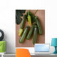 Agriculture - Green zucchini on a stone surface Wall Mural