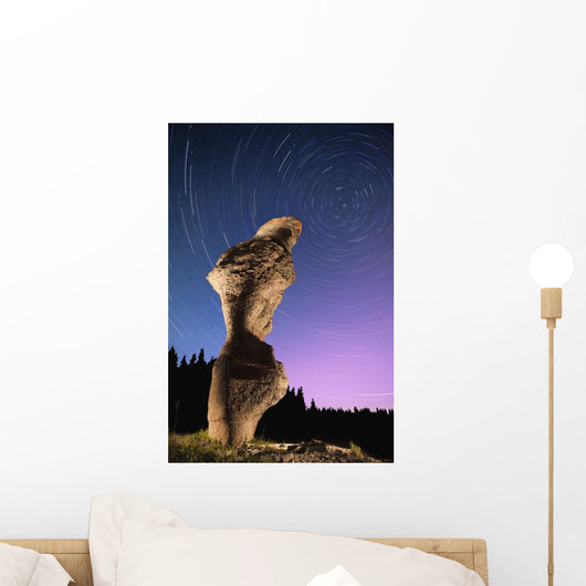 Light painting on monolith and star trails Wall Mural