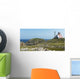 Lighthouse and building along the atlantic coast Wall Mural