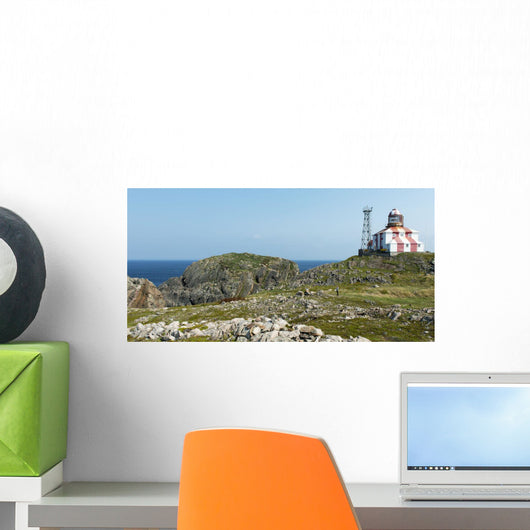 Lighthouse and building along the atlantic coast Wall Mural