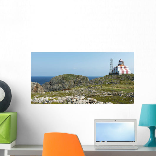 Lighthouse and building along the atlantic coast Wall Mural