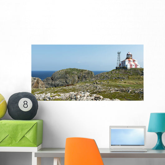 Lighthouse and building along the atlantic coast Wall Mural