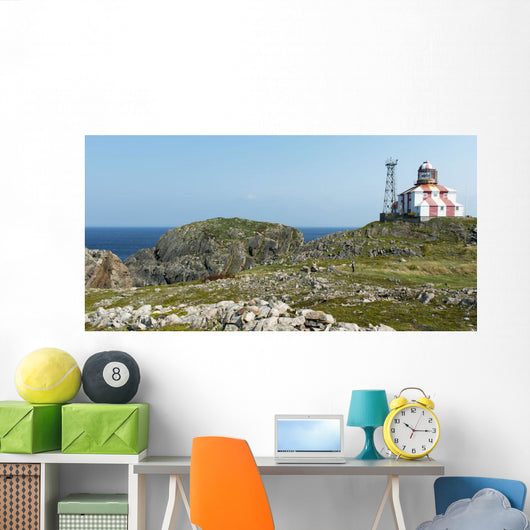 Lighthouse and building along the atlantic coast Wall Mural